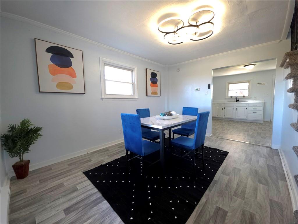 84 Crossridge Road Charleroi, PA 15022 - Photo 21 of 35 a view of a dining room with furniture and wooden floor