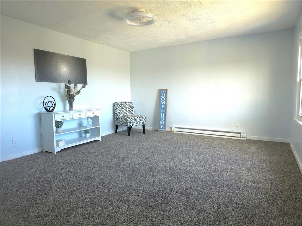 84 Crossridge Road Charleroi, PA 15022 - Photo 23 of 35 a view of a livingroom with furniture and a flat screen tv