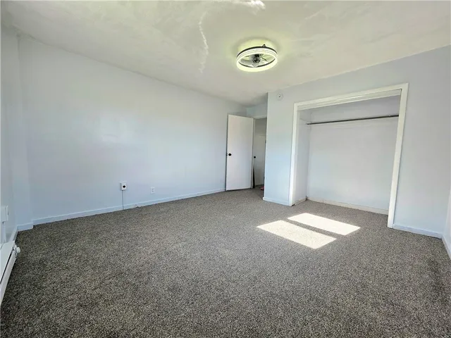 an empty room with a natural light