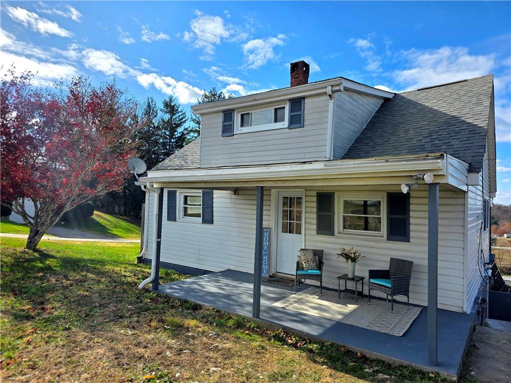 84 Crossridge Road Charleroi, PA 15022 - Photo 3 of 35 a view of a house with backyard and sitting area