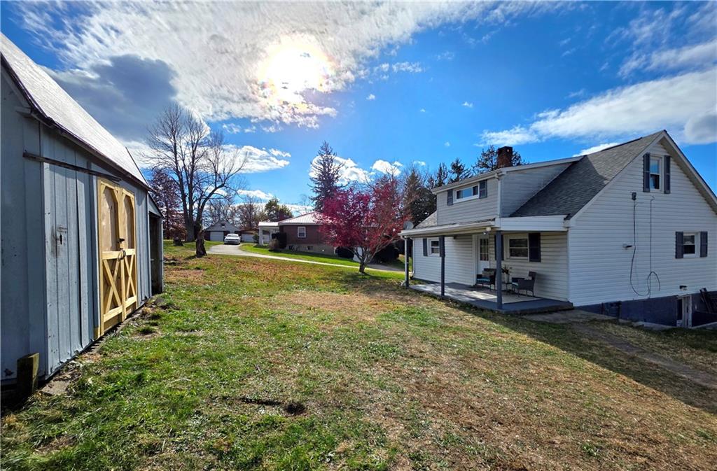 84 Crossridge Road Charleroi, PA 15022 - Photo 5 of 35 a view of a house with backyard and sitting area