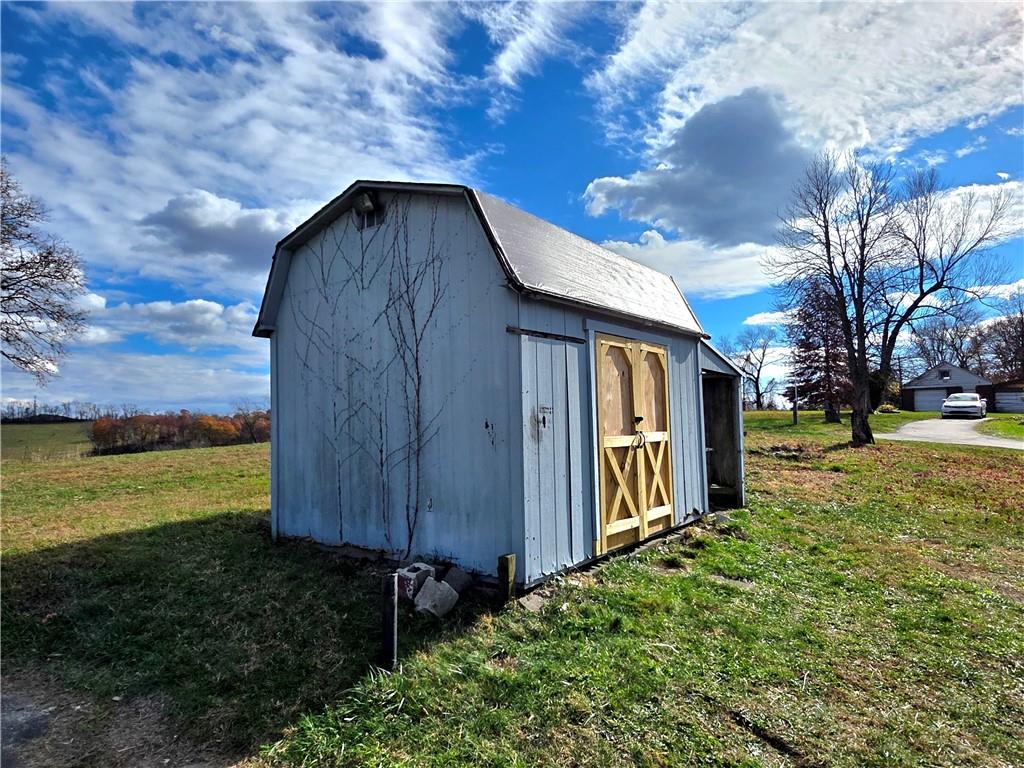 84 Crossridge Road Charleroi, PA 15022 - Photo 6 of 35 a backyard of a house with lots of green space
