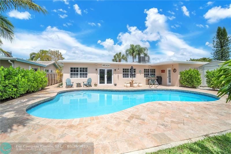 5206 Cleveland Street Hollywood, FL 33021 - Photo 26 of 49 a view of a house with swimming pool