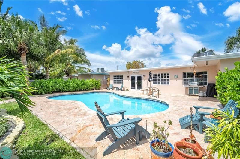 5206 Cleveland Street Hollywood, FL 33021 - Photo 27 of 49 a view of an house with swimming pool and sitting area