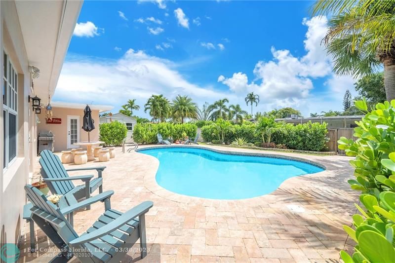 5206 Cleveland Street Hollywood, FL 33021 - Photo 34 of 49 a view of swimming pool with seating space