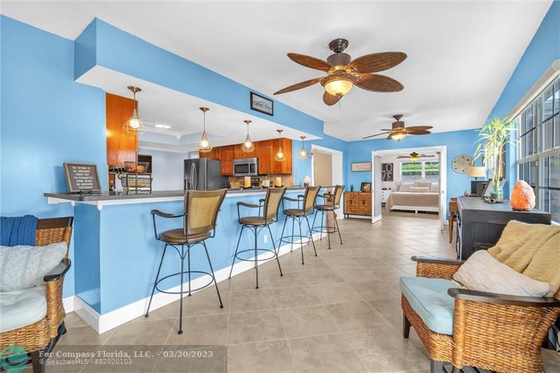 5206 Cleveland Street Hollywood, FL 33021 - Photo 7 of 49 a living room filled with furniture
