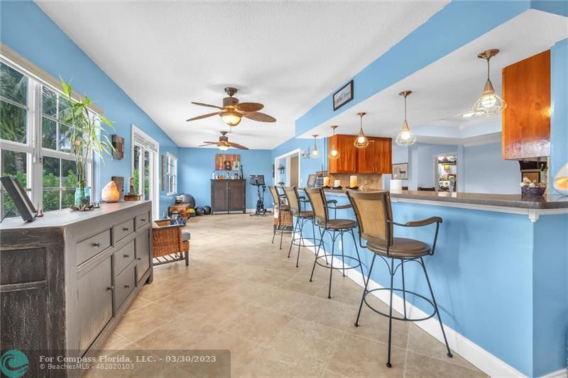5206 Cleveland Street Hollywood, FL 33021 - Photo 8 of 49 a view of a kitchen and dining area