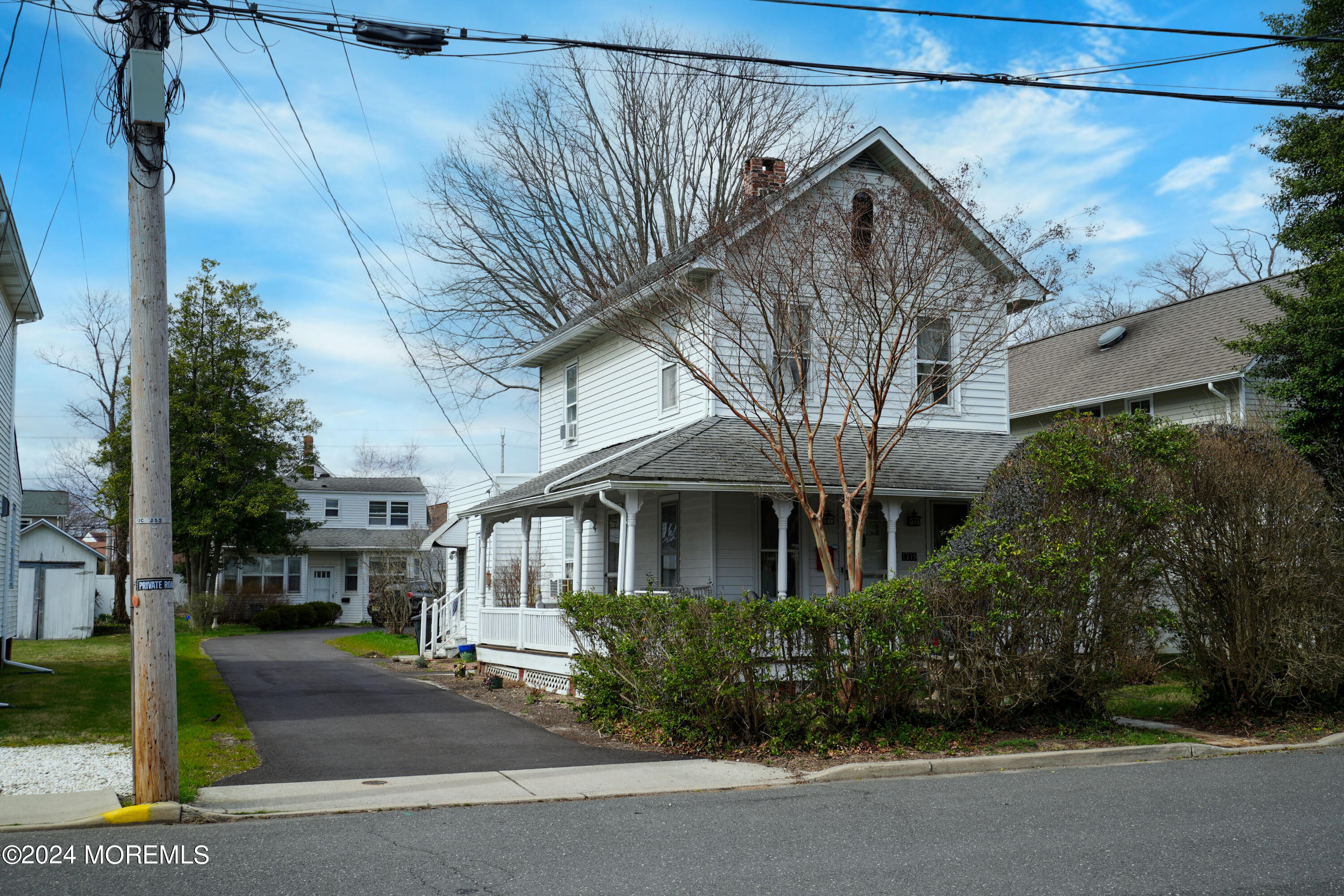 1719 Beverly Avenue Spring Lake Heights, NJ 07762 - Photo 1 of 21 a front view of a house with garden