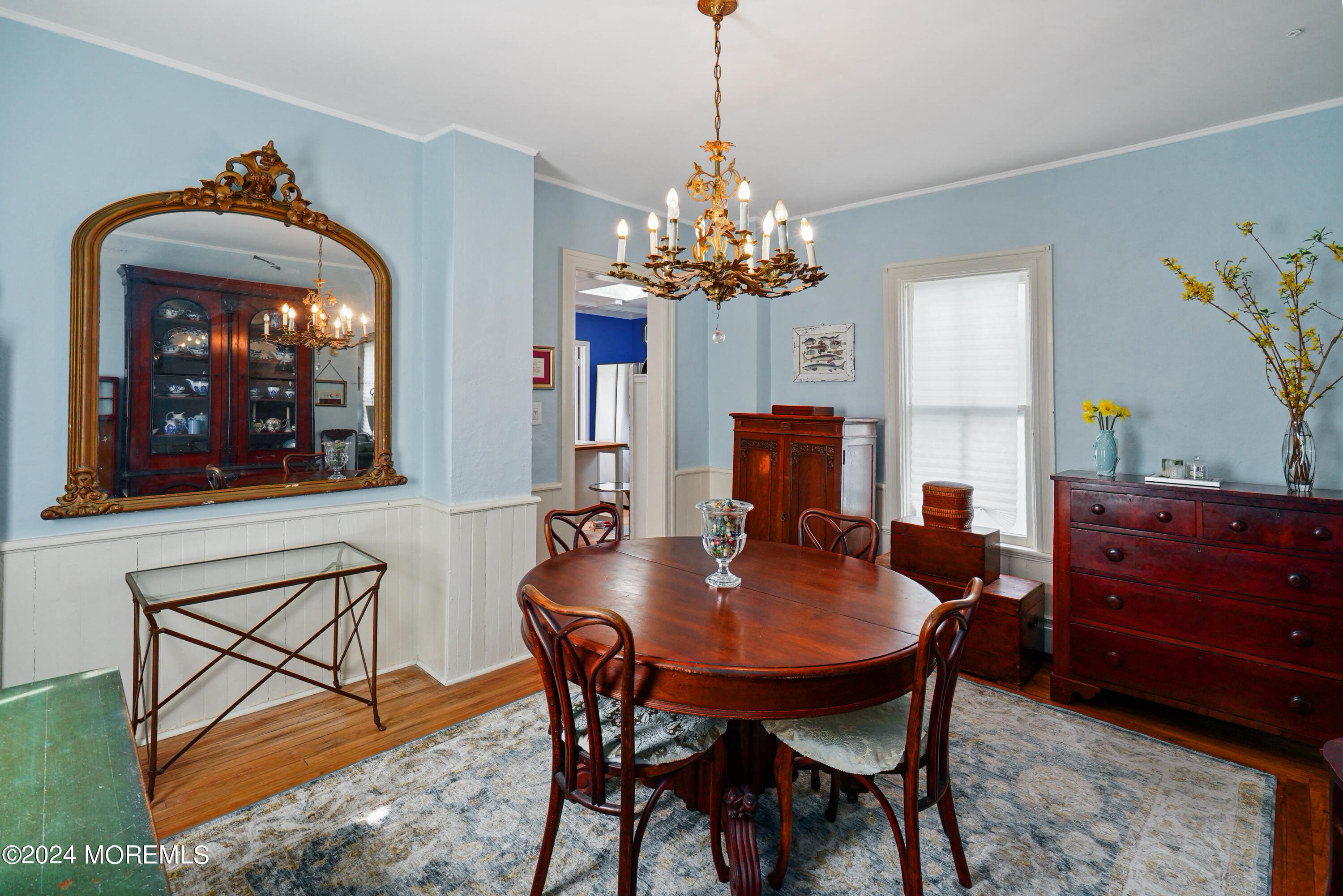 1719 Beverly Avenue Spring Lake Heights, NJ 07762 - Photo 12 of 21 a view of a dining room with furniture and chandelier