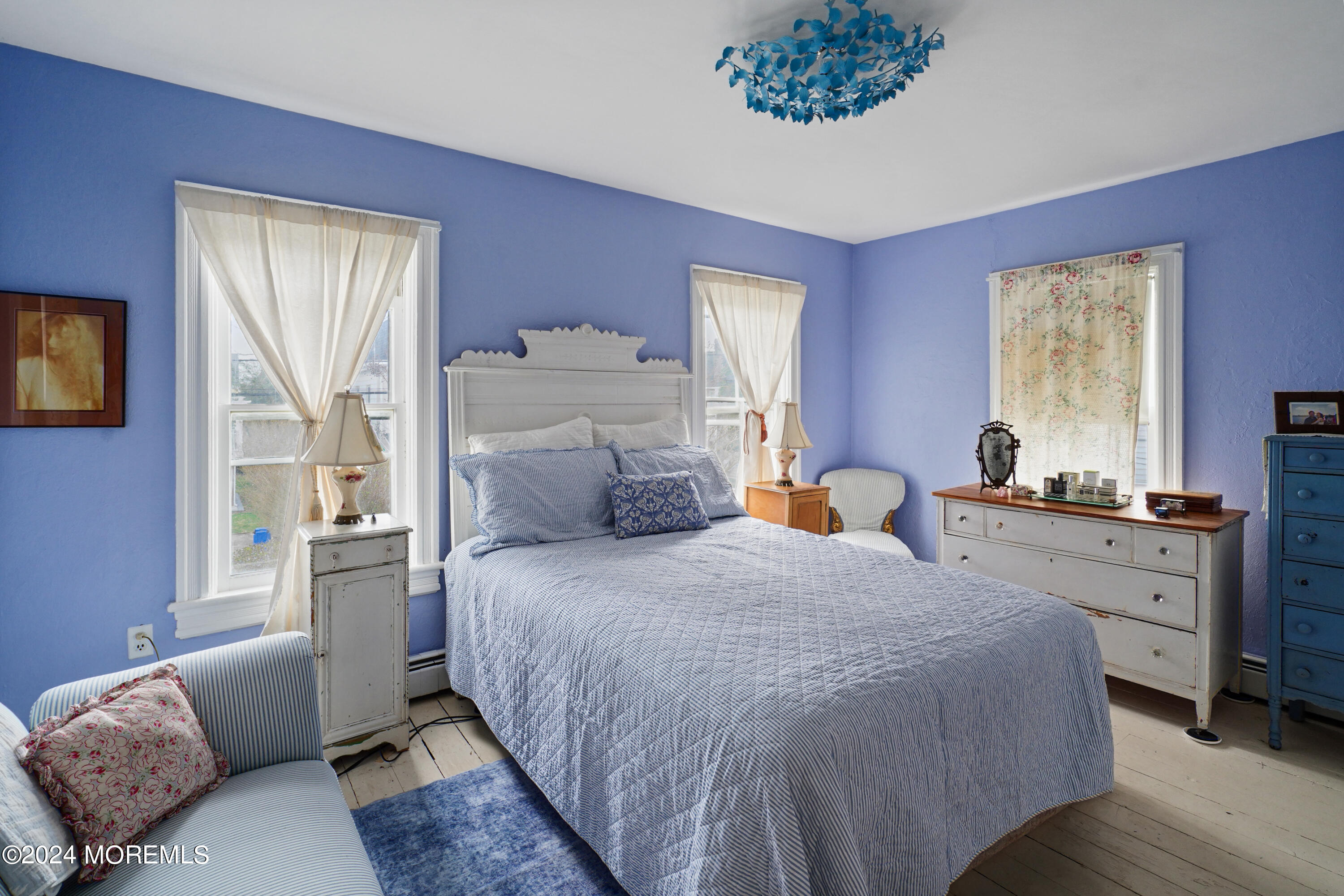 1719 Beverly Avenue Spring Lake Heights, NJ 07762 - Photo 20 of 21 a bedroom with a bed and a couch