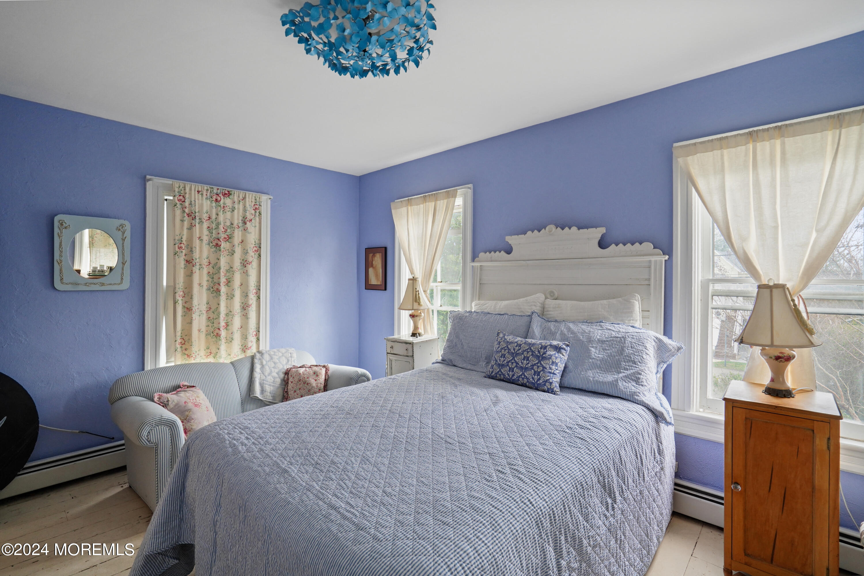 1719 Beverly Avenue Spring Lake Heights, NJ 07762 - Photo 21 of 21 a bedroom with a bed and wooden floor