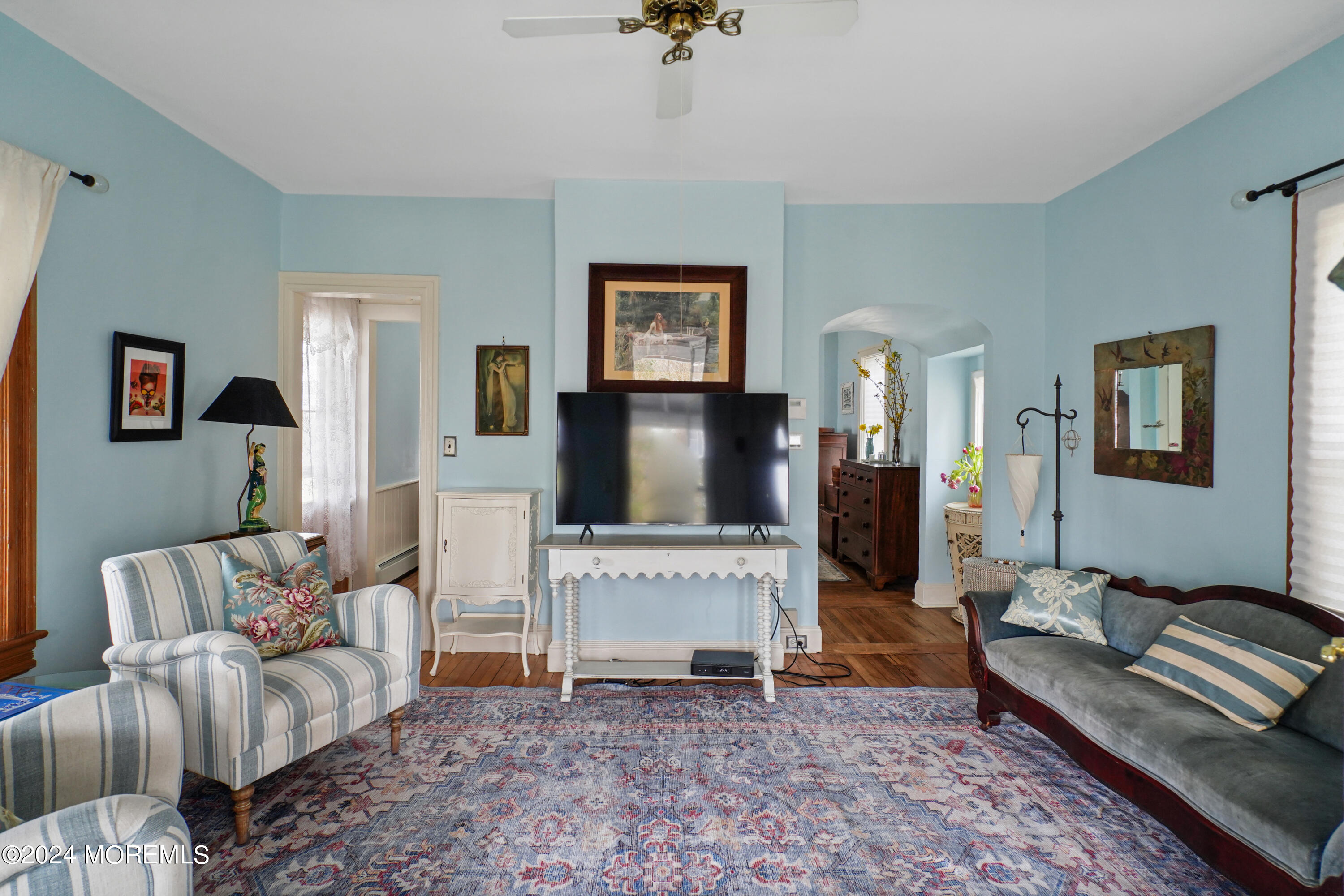 1719 Beverly Avenue Spring Lake Heights, NJ 07762 - Photo 10 of 21 a living room with furniture a rug and a flat screen tv