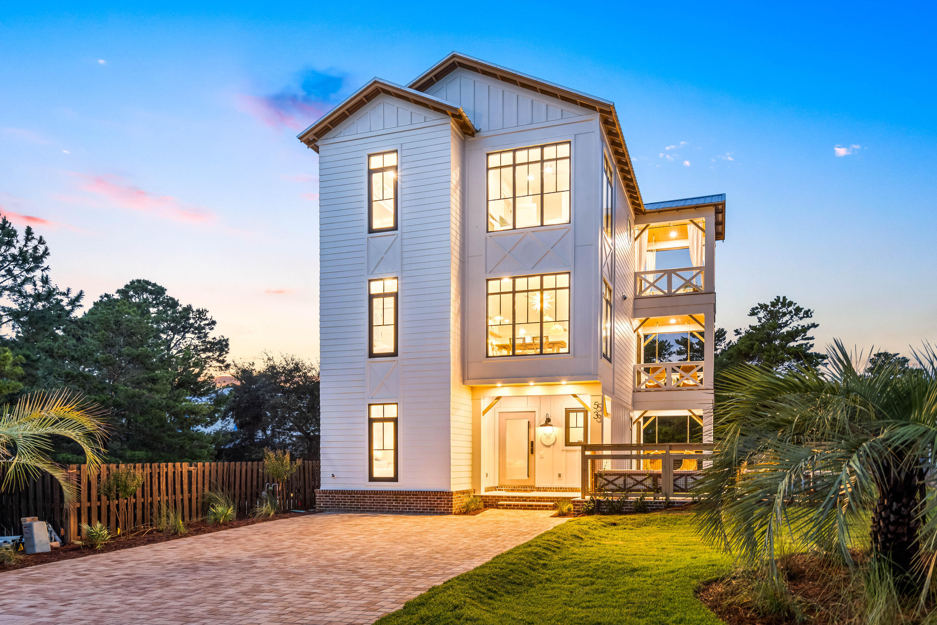 53 Porpoise Street Santa Rosa Beach, FL 32459 - Photo 1 of 75 a front view of a house with a yard