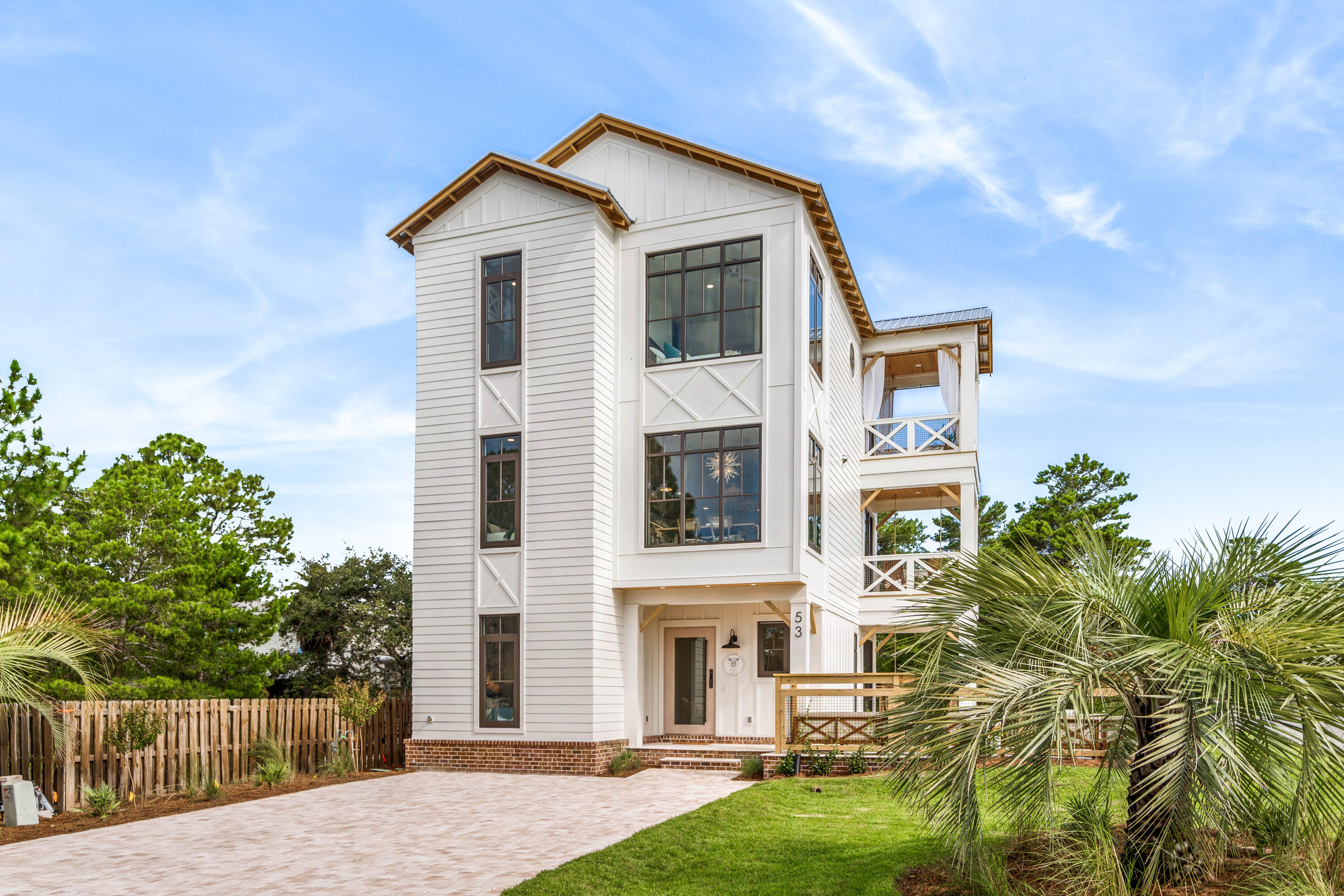 53 Porpoise Street Santa Rosa Beach, FL 32459 - Photo 12 of 75 a front view of a house with a yard