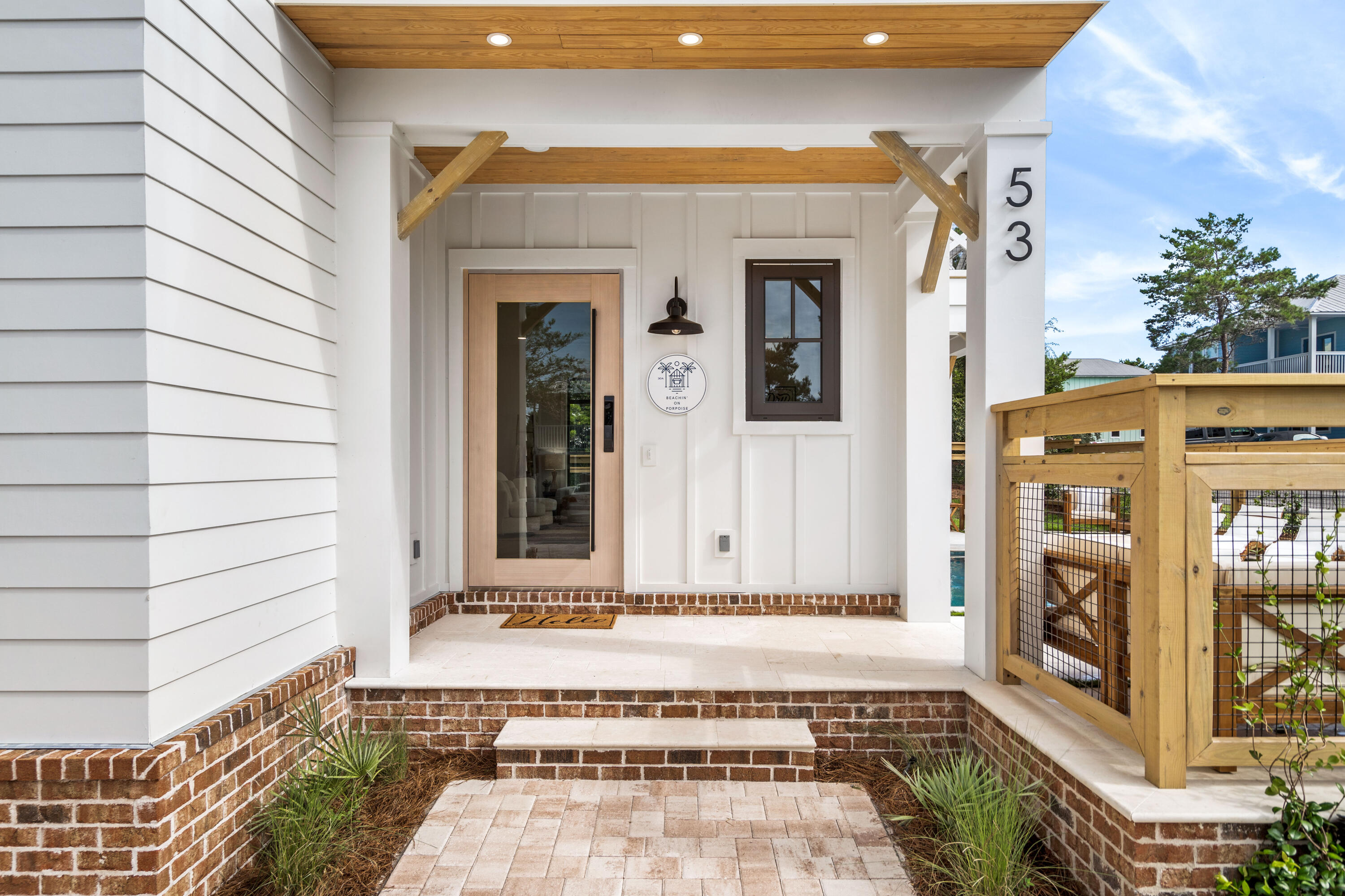 53 Porpoise Street Santa Rosa Beach, FL 32459 - Photo 18 of 75 a view of a entryway door of the house