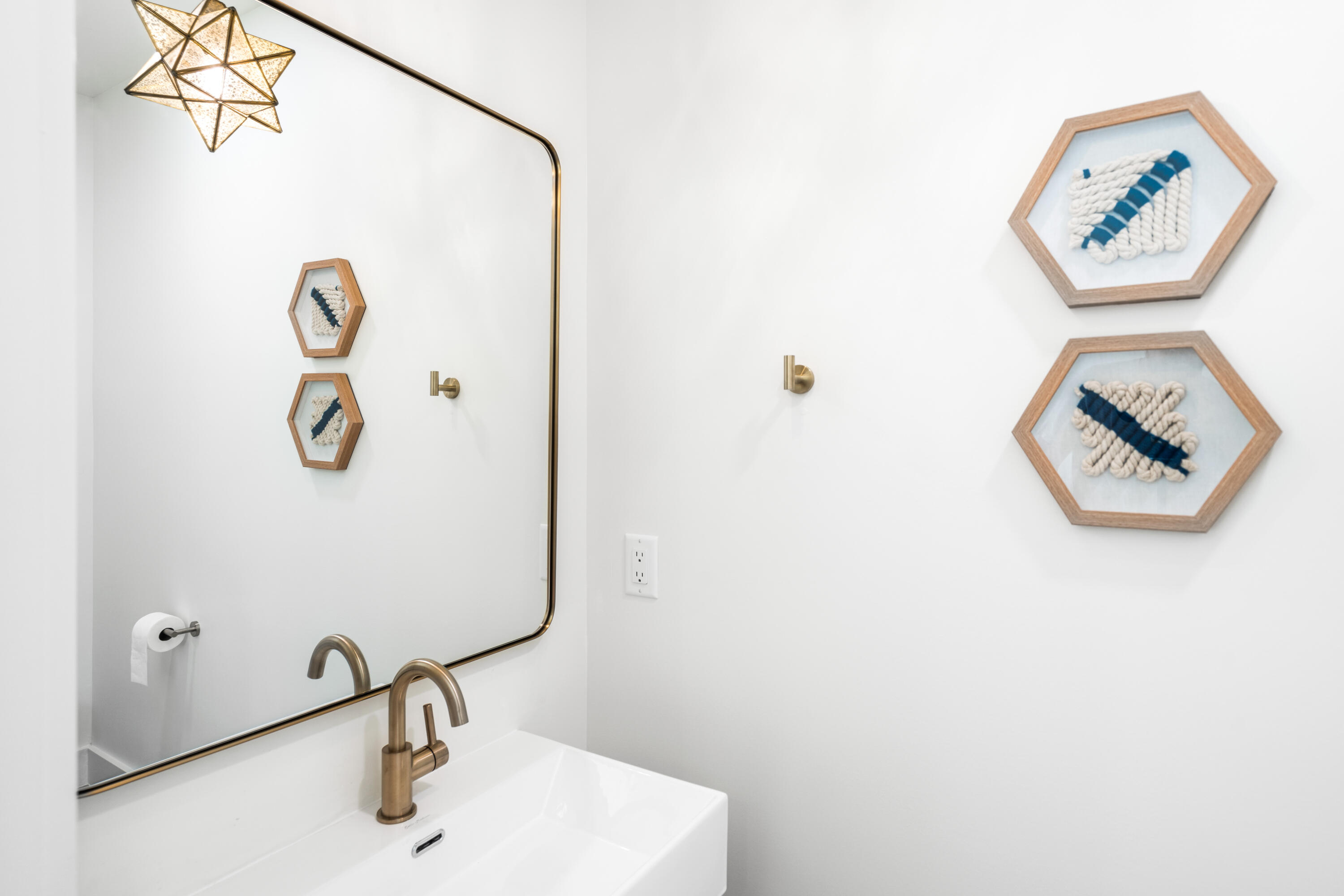 53 Porpoise Street Santa Rosa Beach, FL 32459 - Photo 24 of 75 a bathroom with a sink and a mirror