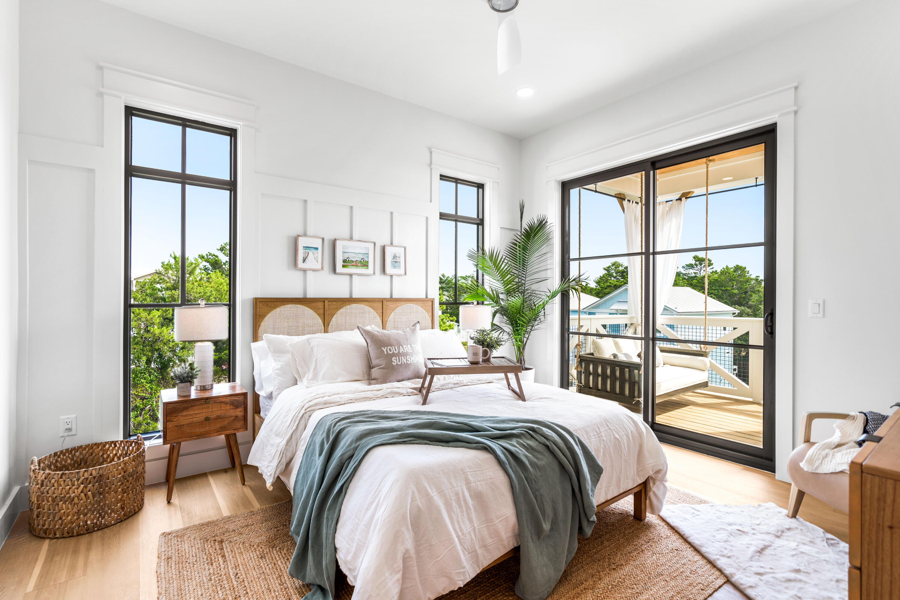 53 Porpoise Street Santa Rosa Beach, FL 32459 - Photo 61 of 75 a bedroom with a large bed and a large window