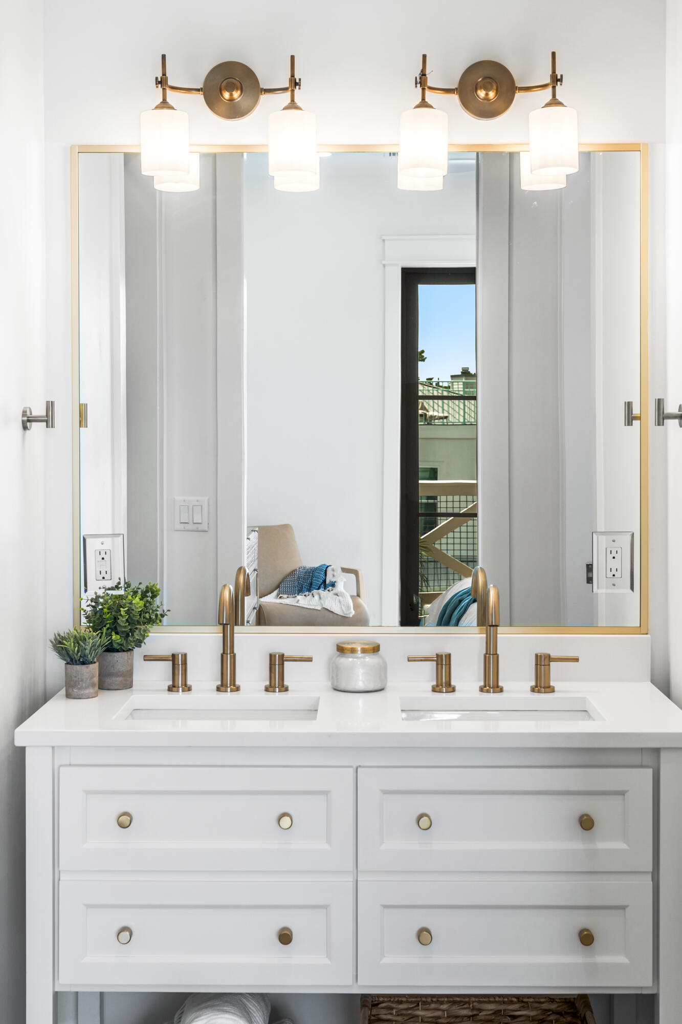 53 Porpoise Street Santa Rosa Beach, FL 32459 - Photo 65 of 75 a bathroom with a double vanity sink and a mirror