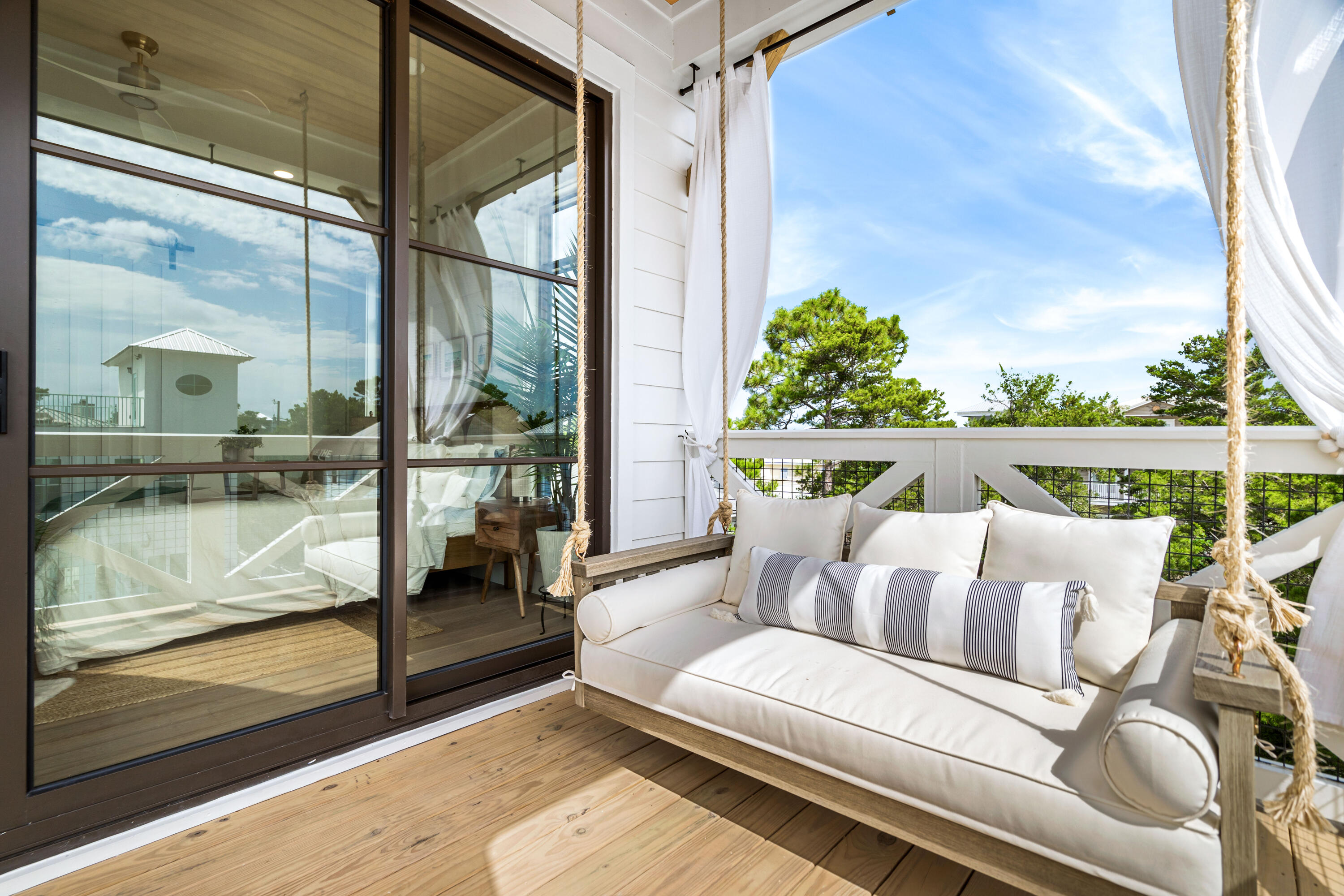 53 Porpoise Street Santa Rosa Beach, FL 32459 - Photo 71 of 75 a balcony with furniture