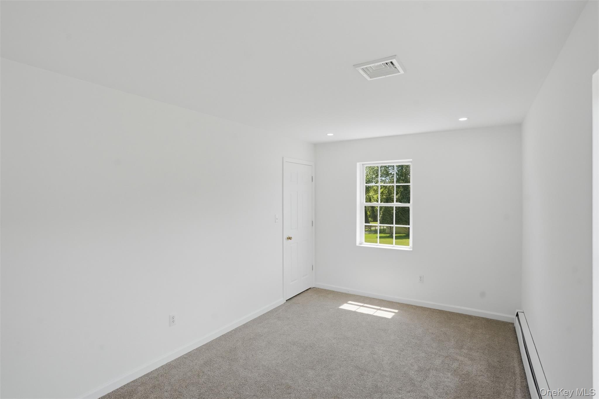 160 Pirog Road Pine Bush, NY 12566 - Photo 22 of 50 a view of an empty room with a window