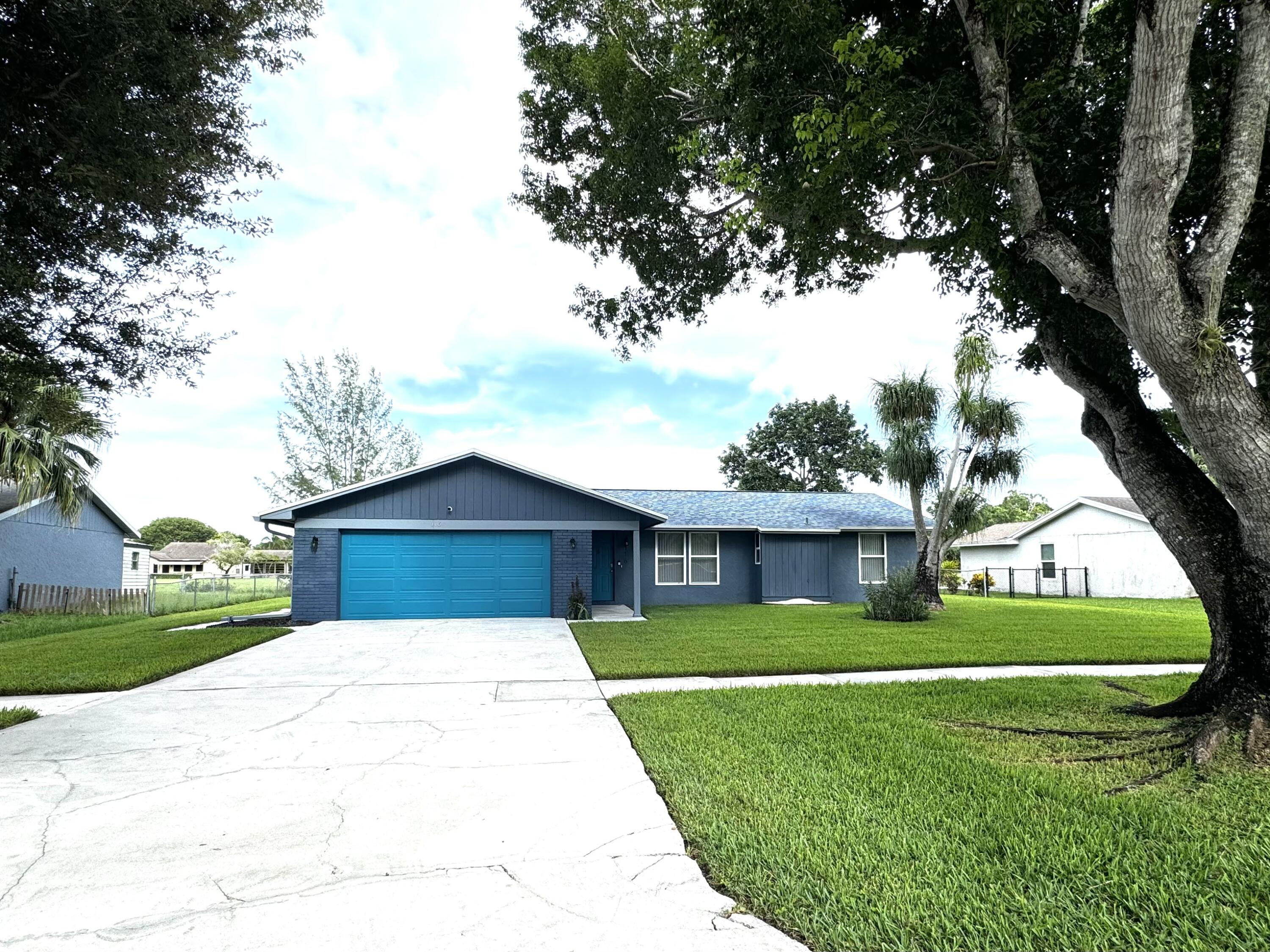 116 Park Road North Royal Palm Beach, FL 33411 - Photo 1 of 20 Front