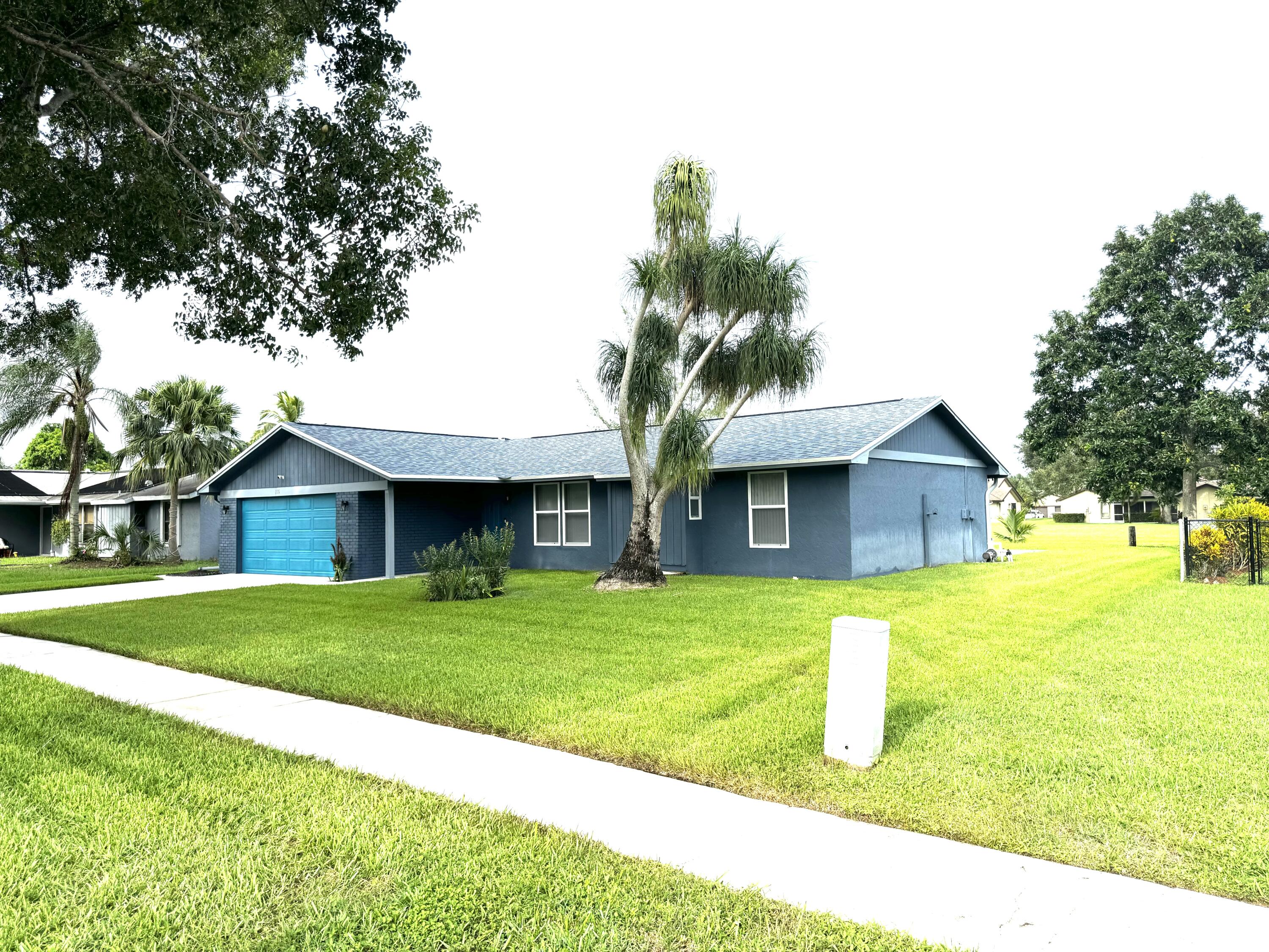 116 Park Road North Royal Palm Beach, FL 33411 - Photo 18 of 20 Front