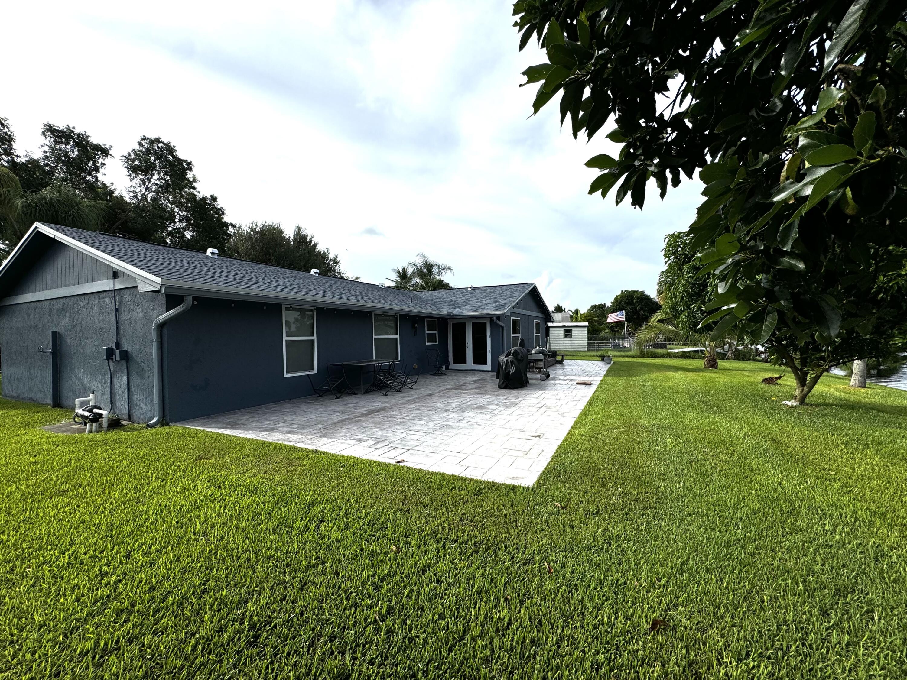 116 Park Road North Royal Palm Beach, FL 33411 - Photo 19 of 20 Patio