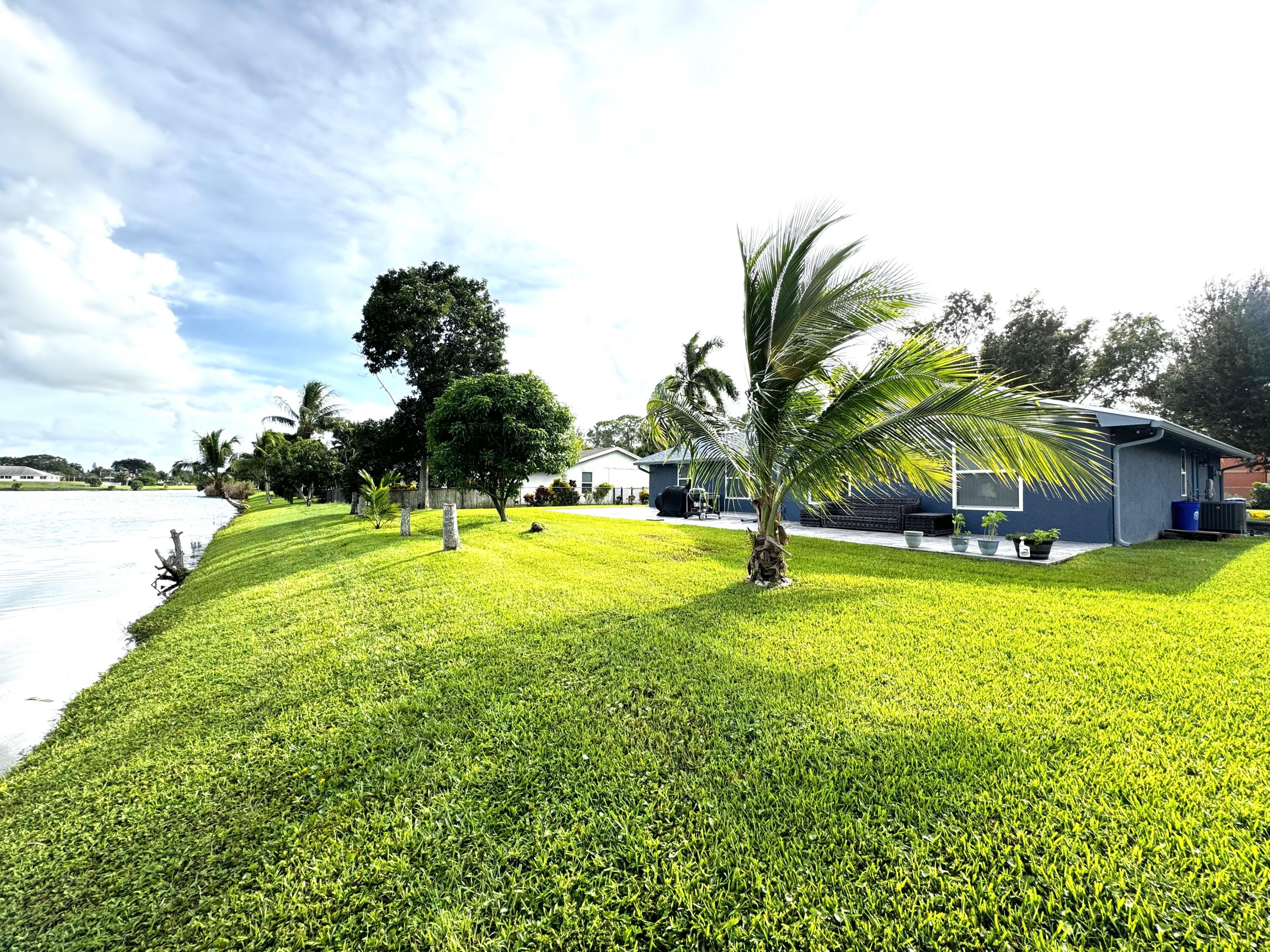 116 Park Road North Royal Palm Beach, FL 33411 - Photo 5 of 20 Back yard