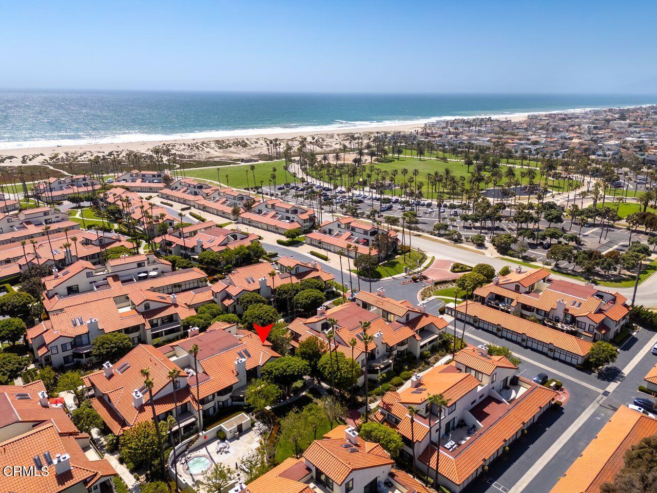 1941 Majorca Drive Oxnard, CA 93035 - Photo 1 of 39 an aerial view of residential building with parking space