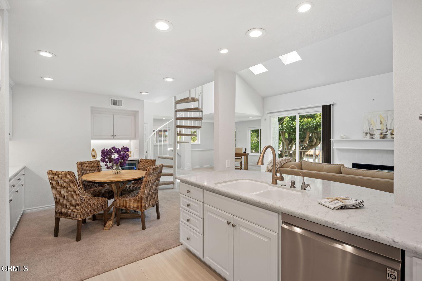 1941 Majorca Drive Oxnard, CA 93035 - Photo 11 of 39 a dining hall with stainless steel appliances kitchen island granite countertop a sink and dishwasher