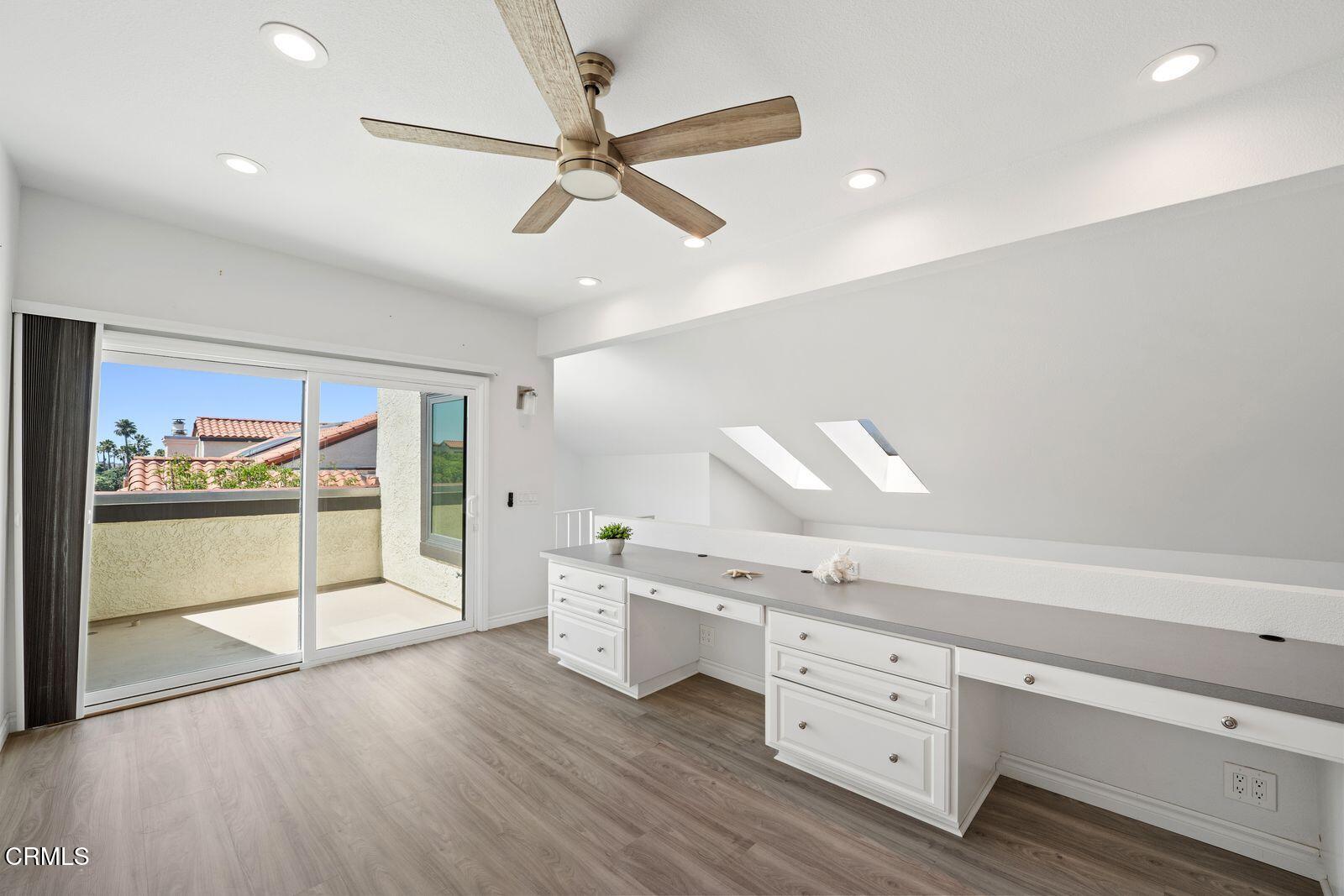 1941 Majorca Drive Oxnard, CA 93035 - Photo 24 of 39 wooden floor with white cabinets and window