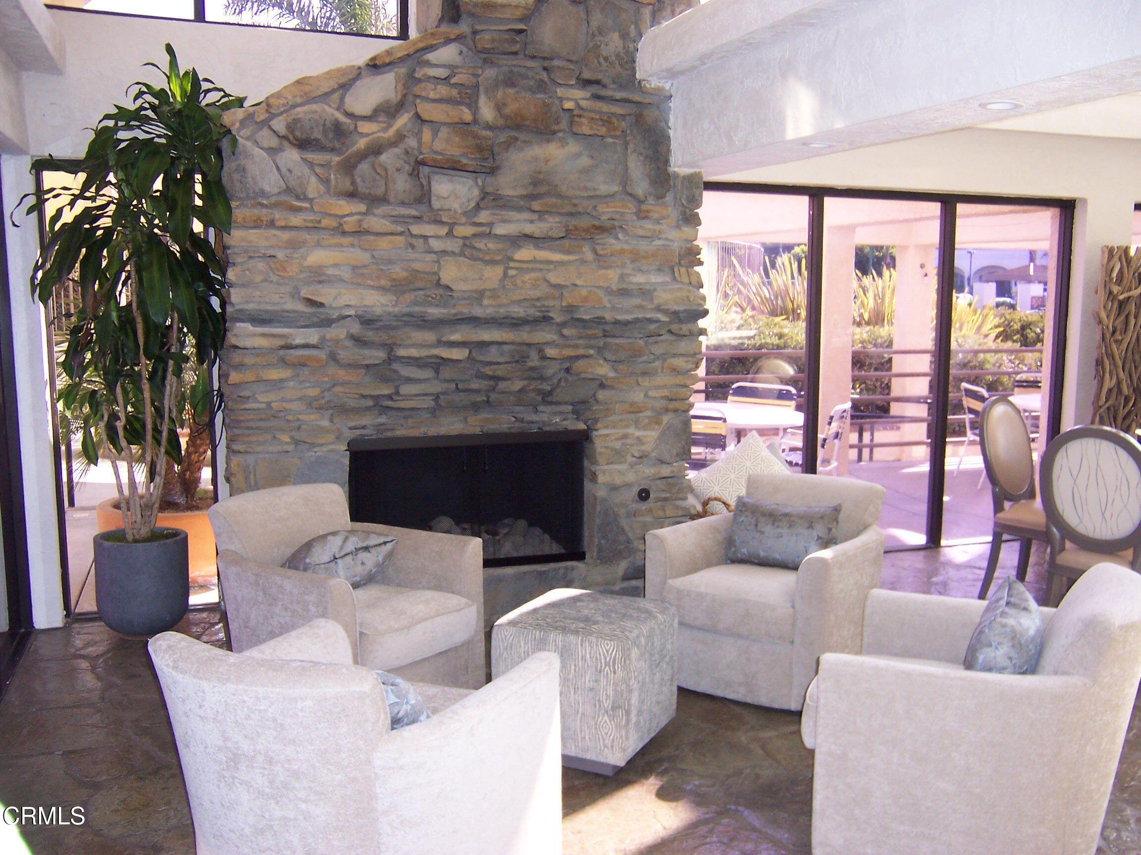 1941 Majorca Drive Oxnard, CA 93035 - Photo 34 of 39 a living room with furniture and a fireplace