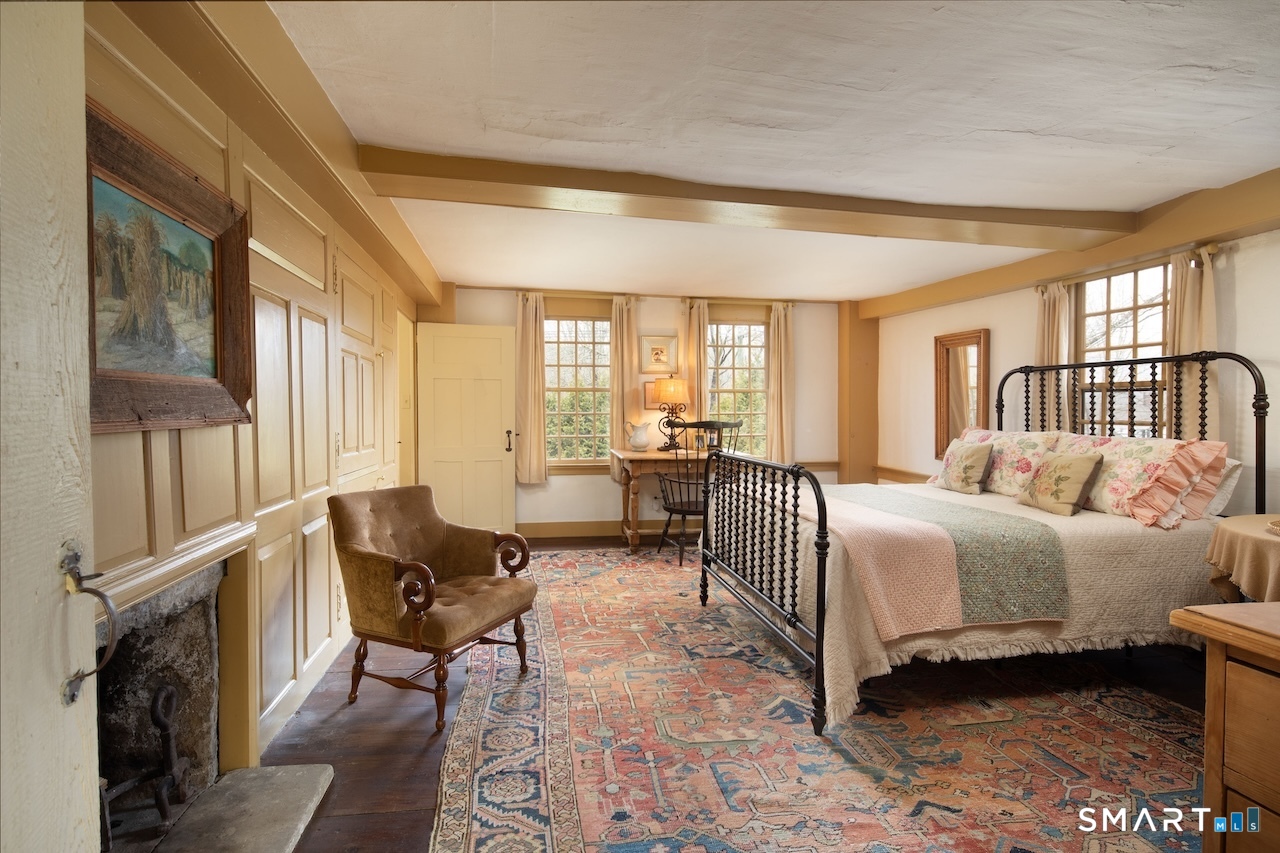 3 Studio Hill Road Kent, CT 06757 - Photo 15 of 33 a spacious bedroom with a bed and glass windows