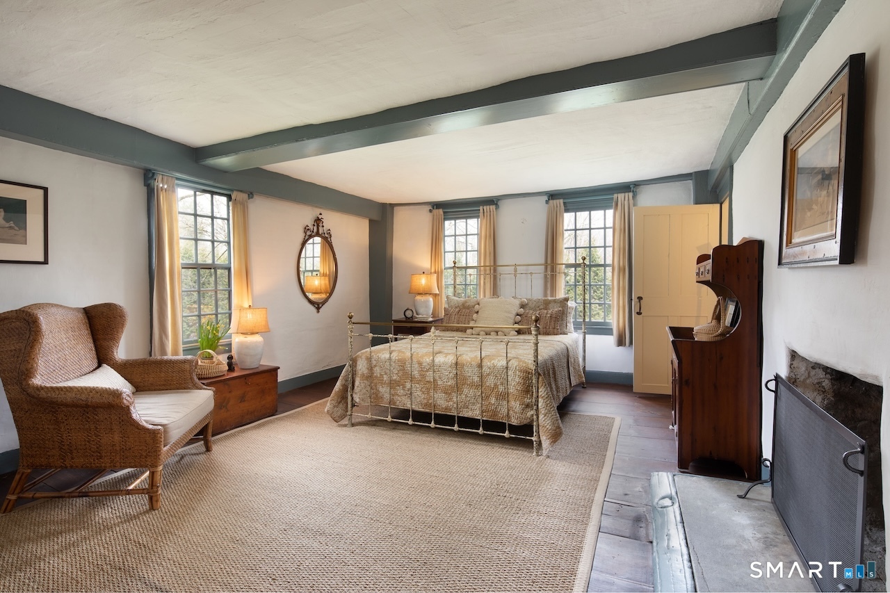 3 Studio Hill Road Kent, CT 06757 - Photo 17 of 33 a bedroom with a bed and large window
