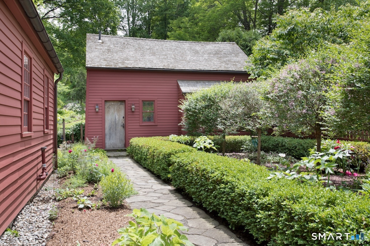 3 Studio Hill Road Kent, CT 06757 - Photo 20 of 33 a view of a house with a garden