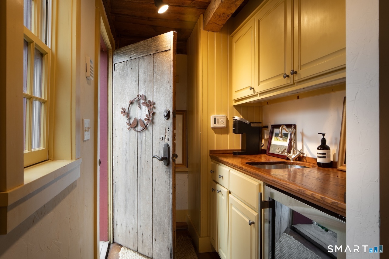 3 Studio Hill Road Kent, CT 06757 - Photo 22 of 33 a kitchen with a sink and cabinets