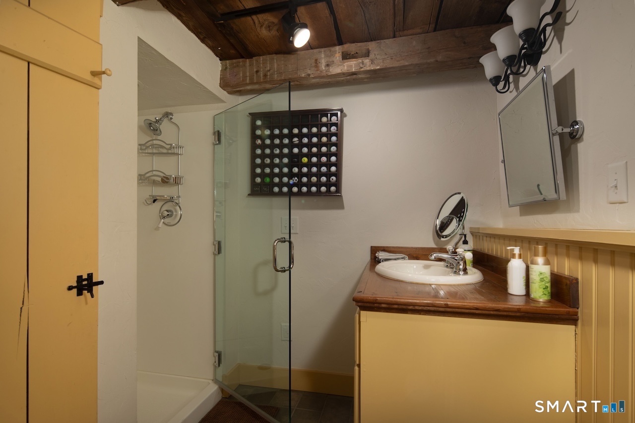 3 Studio Hill Road Kent, CT 06757 - Photo 24 of 33 a bathroom with a sink toilet and shower