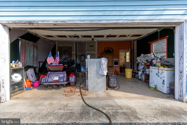 a view of yard with patio