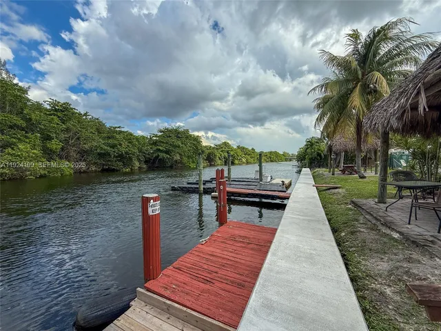 a view of a lake with sitting area