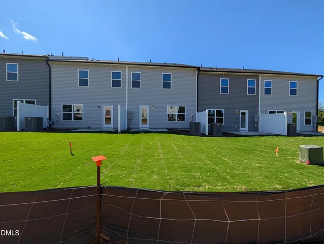 a view of swimming pool with a yard