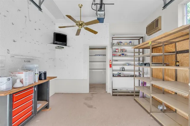 a storage & utility room with washer and dryer