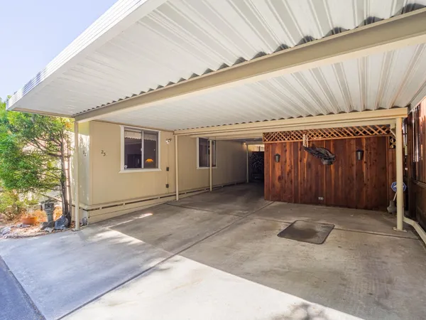 a patio with a table and chairs