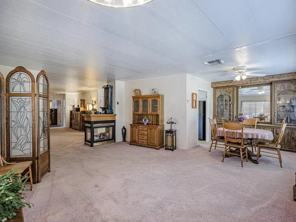 a view of a dining room with furniture