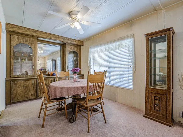a view of a dining room with furniture