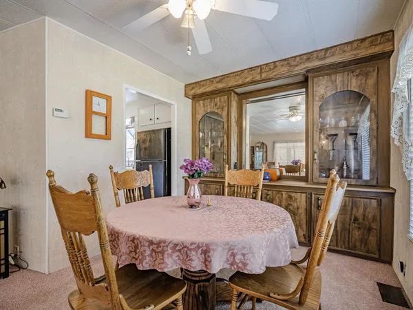 a view of a dining room with furniture