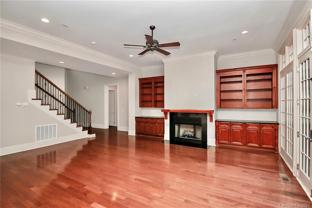 6701 Sharon Road Charlotte, NC 28210 - Photo 19 of 47 a living room with furniture and a fireplace