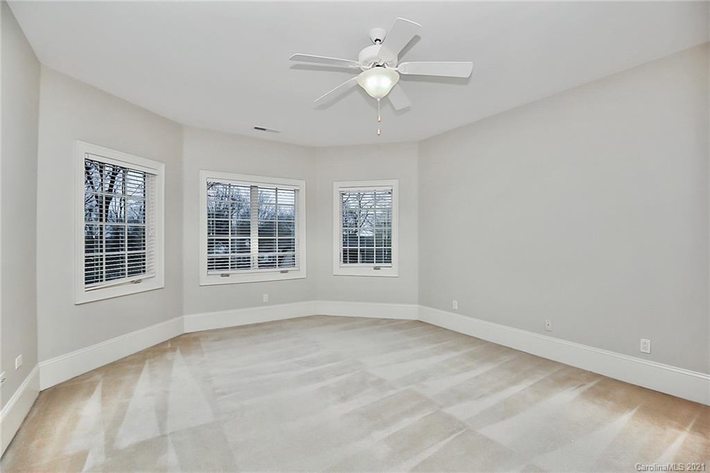 6701 Sharon Road Charlotte, NC 28210 - Photo 34 of 47 a view of an empty room with a window