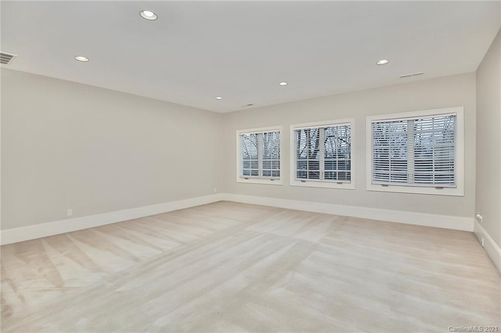 6701 Sharon Road Charlotte, NC 28210 - Photo 37 of 47 an empty room with windows