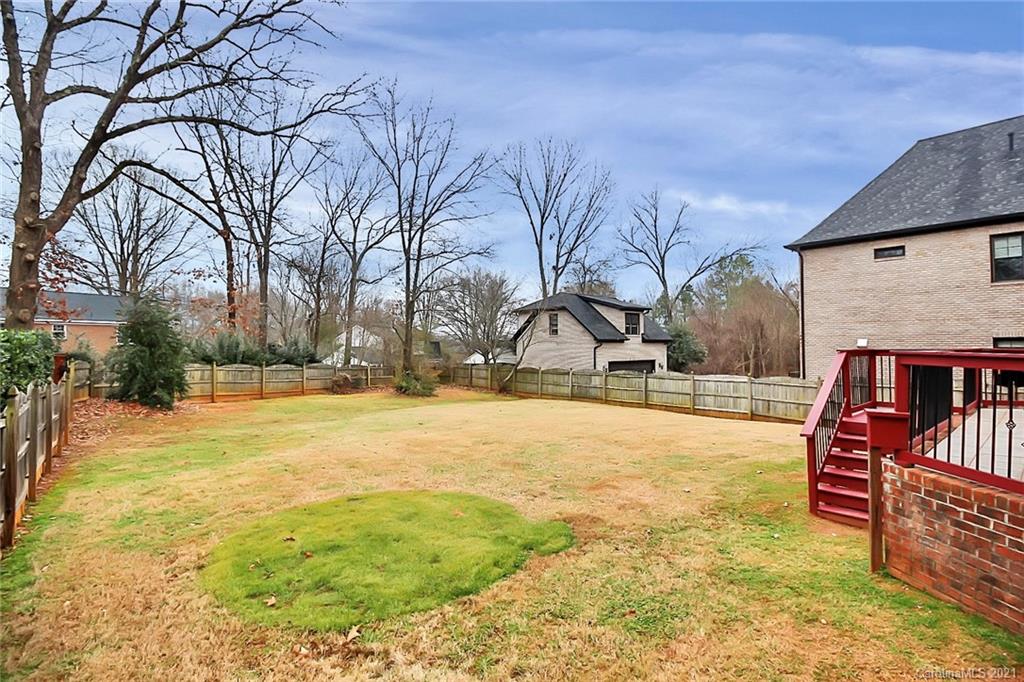 6701 Sharon Road Charlotte, NC 28210 - Photo 47 of 47 a swimming pool with yard and outdoor seating