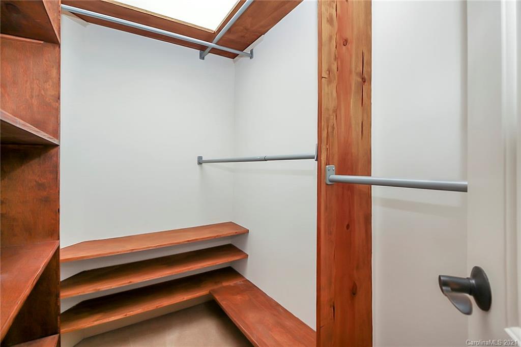 6701 Sharon Road Charlotte, NC 28210 - Photo 10 of 47 a bathroom with a shower